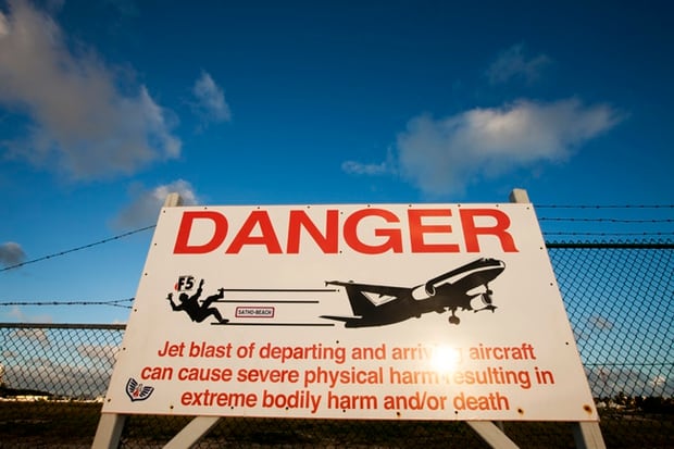 The warnings to tourists outside the airport. Photo / Getty Images