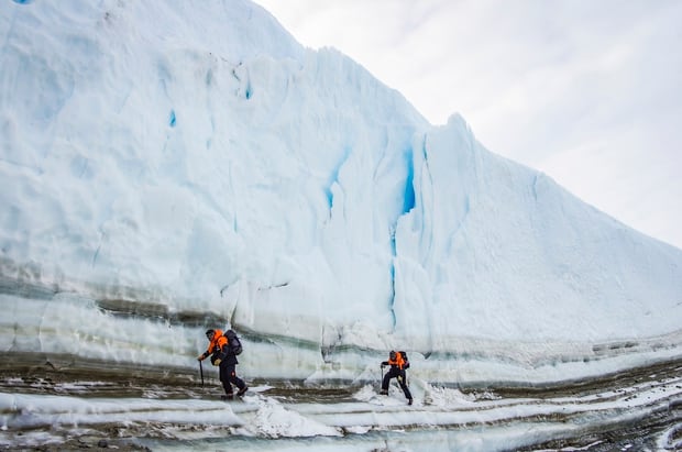 Two scientists scout Antarctica's Taylor Glacier for a potential ice core sampling site. Photo / Supplied