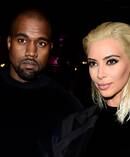 Kim Kardashian and Kanye West attend the Balmain show. Photo / Getty 