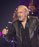 Neil Diamond will no longer perform in New Zealand this year after being diagnosed with Parkinson's disease.