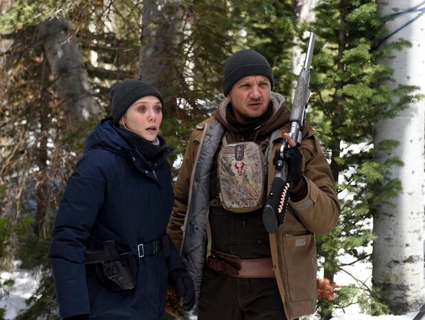 Elizabeth Olsen and Jeremy Renner in Wind River. 
