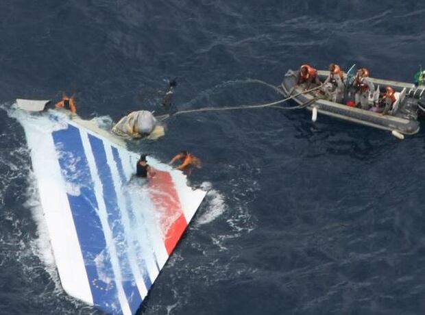 Brazilian navy sailors recover debris from crashed Air France flight 447 in the Atlantic Ocean in 2011. Photo / AP 