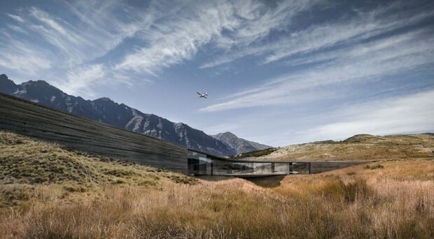 The house is designed to sit low in the landscape, dominated by The Remarkables.