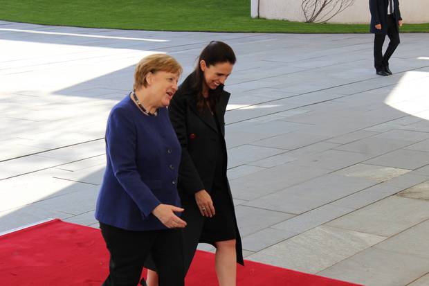 PM Jacinda Ardern greeted with military honours and German Chancellor Angela Merkel at the Federal Chancellery in Berlin. Photo / Claire Trevett