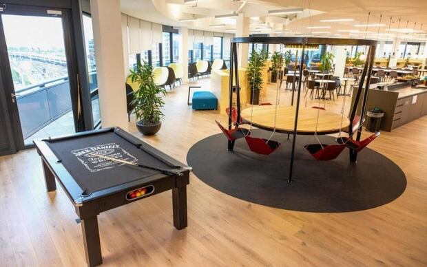 Swing chairs make meetings at Deliveroo a bit more fun. Photo / Deliveroo