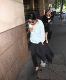 Kumuthini Kannan seen exiting the Melbourne Magistrates' Court. She and her husband are accused of keeping a slave. Photo / AAP