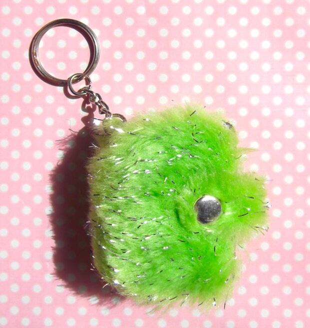 Green fluffy notebook key chain. Photo / Etsy
