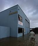 A storm system combined with a king tide has caused flooding around Tauranga. Photo/John Borren