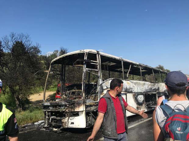 A bus carrying Kiwis and Australians to Anzac Cove went up in flames. Photo / Laura Smith