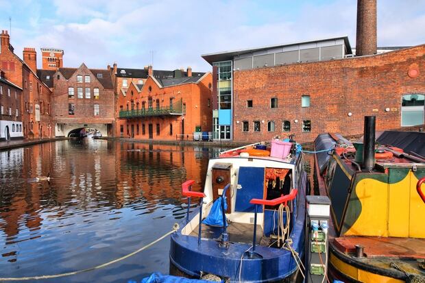 Colourful barges on Birmingham's water canal network. Photo / 123RF