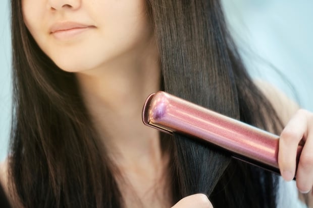 You should only use straighteners when you hair is completely dry, or it can cause damage. Photo / Getty Images 