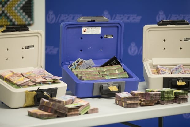 Around $2 million cash was seized during Operation Genoa. Photo/NZ Herald.