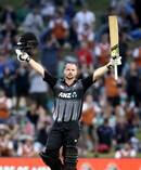 Colin Munro celebrates his century during game three of the Twenty20 series between New Zealand and the West Indies. Photo / Getty Images