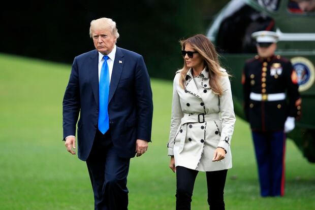 President Donald Trump and first lady Melania Trump walk on the South Lawn of the White House in Washington. Photo / AP