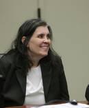 Louise Anna Turpin smiles as she appears in court with her attorney Jeff Moore for an arraignment in Riverside. Photo / AP