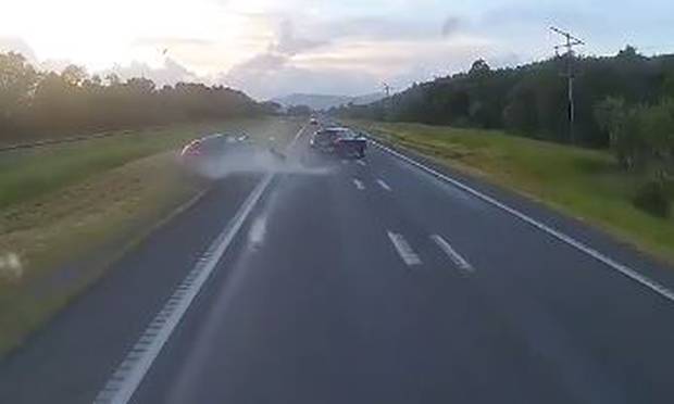 The vehicle with the elderly couple inside, right, veers off the road. 