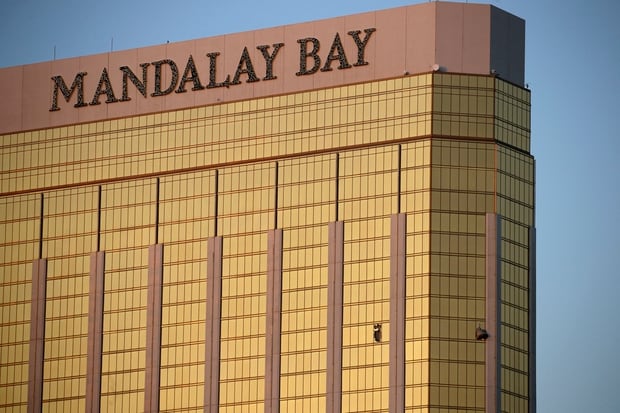 Broken windows from the hotel room on the 32nd floor of the Mandalay Bay Resort and Casino where gunman Stephen Paddock carried out his mass shooting. Photo / AP