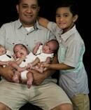 Martin Magaoa with his sons Tanner, 6, and triplets Aayden, Blaise and Carson, who were born on August 31, 2017, in Hawaii. Photo / Jo-Photography