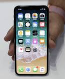 A new patent put forward by Apple appears to describe wireless iPhone charging. Photo / AP