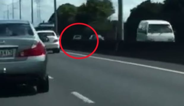 The car drove up the motorway before speeding up the onramp. Photo / Aaron Giles