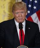 President Trump's lawyer reportedly paid a porn star to stop her from discussing an alleged sexual encounter with Trump. Photo / AP