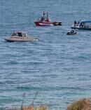 The search and rescue operation taking place on Lake Wakatipu. Photo / James Allan