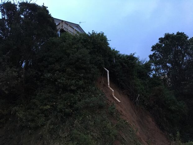 The house is uncomfortably close to the slip. Photo / Georgina Campbell 