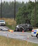 Police work at the scene of a fatal two-car crash about 1km north of Glenavy yesterday. Photo / Hamish MacLean