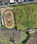 A photographer was critically injured when they were struck by a stock car at the Waikaraka Park Speedway this evening. Image / Google Maps
