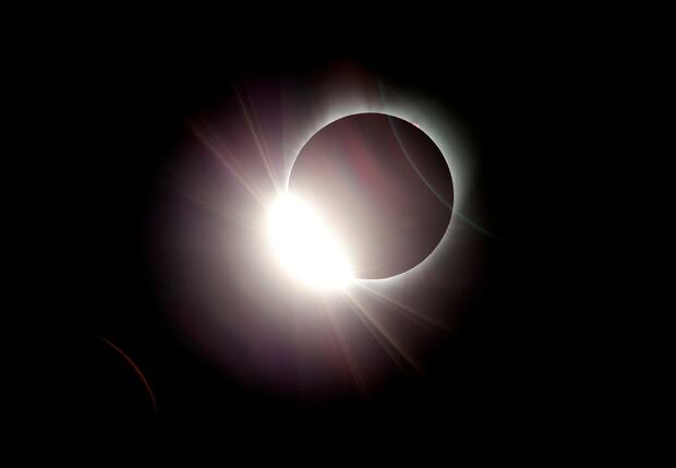 The moon almost totally eclipses the sun during a near total solar eclipse as seen from Salem, Oregon. Photo / AP