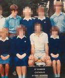 Philip, third from the back in a high school photo, around the time the abuse began.