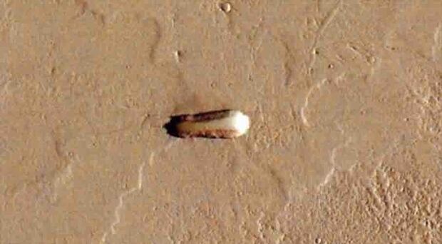 ALIEN LIFE? Conspiracy theorists believe this is proof of an alien ship on Mars. Photo / Paranormal Crucible / YouTube