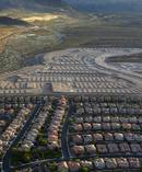 Housing lots sit empty along the western edge of Las Vegas in 2016. Some cities are still struggling to shed the scars of recession. Photo / AP