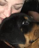 Grace Read with her pet Rosko before the animal was cruelly snatched from her arms by two strangers yesterday. Photo / Supplied