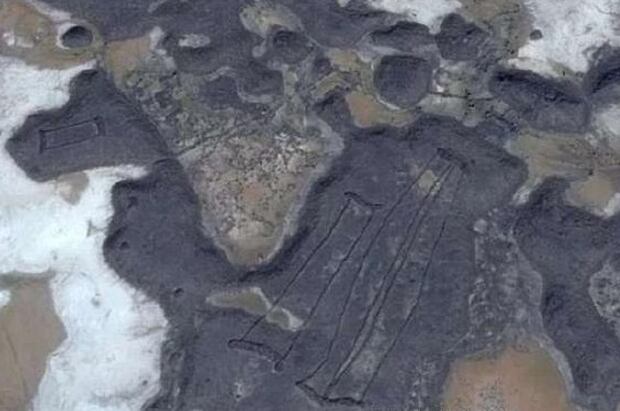 The mysterious stone structures are seen piled on ancient lava fields. Photo / Google Earth