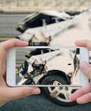 Police say a rise in number of people taking photos and recording videos are crash scenes is causing concern. Photo / 123RF
