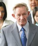 Former US Army deserter to North Korea, Charles Jenkins, together with his daughters Mika, rear left, and Brinda at Narita International Airport. Photo/AP