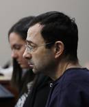 Dr. Larry Nassar is seated during the seventh day of his sentencing hearing. Photo / AP Photo