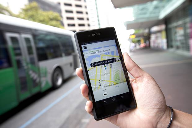 Uber drivers are getting in on the commuting boom too - some part timers are making extra money by picking people up on the way to their own jobs. Photo / Dean Purcell