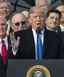 US President Donald Trump today celebrated his first major legislative win with sweeping tax reforms, but NZ may go against him in an upcoming United Nations vote. Photo / AP