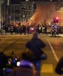People gather during the demonstration against the upcoming visit of US President Donald Trump at the World Economic Forum (WEF) in Davos, in the streets of Zurich. Picture / AP