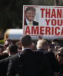 US President Donald Trump greets people on the tarmac as he arrives on Air Force One at Palm Beach International Airport, in Florida last weekend. Photo / AP