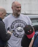 Head Hunter president Wayne Doyle speaks to police as $6m of property restrained in September. Photo / NZ Herald
