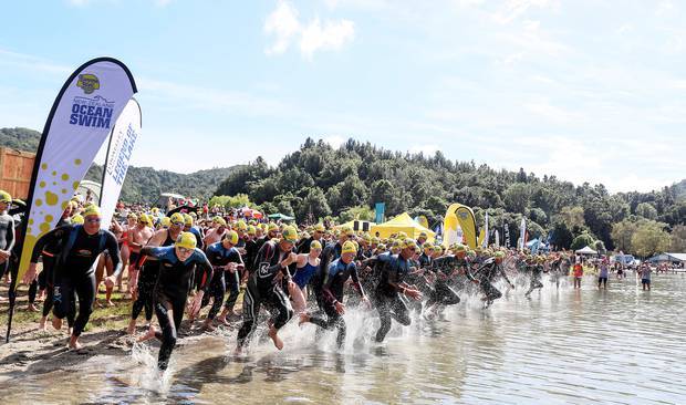 Swimmers take to the water at Lake Tikitapu (Blue Lake) during the Donnelly Sawmillers Rotorua Legend of the Lake event. Photo / Simon Watts