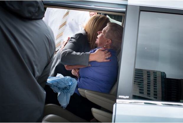 A hug for Mary Lyon, who had to wait more than 40 years for justice for her two little girls, abducted and murdered in 1975. Photo / Washington Post