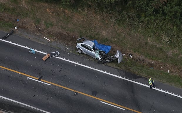 The driver of this car died after colliding with a logging truck on notoriously dangerous State Highway 2 near Omokoroa. Photo / File 