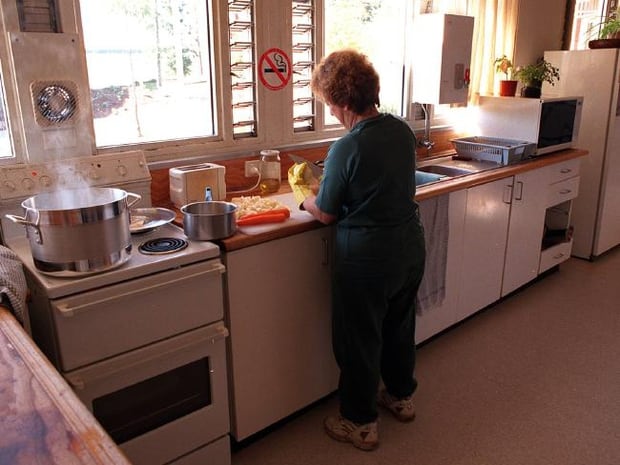 An inmate prepares a meal at Silverwater women's prison in an area with cooking facilities that would be prohibited for Katherine Knight. Photo / News Corp Australia