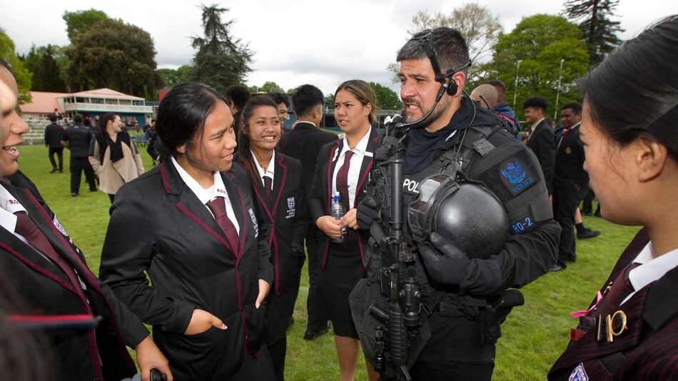 Rotorua Girls' High School students speak to a AOS member at the launch for a new school police studies course at Rotorua Boys' High School.Photo/Ben Fraser