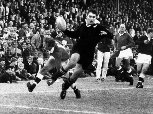 All Blacks legend Colin Meads evades a tackle in the match against Border during the 1970 tour of South Africa.