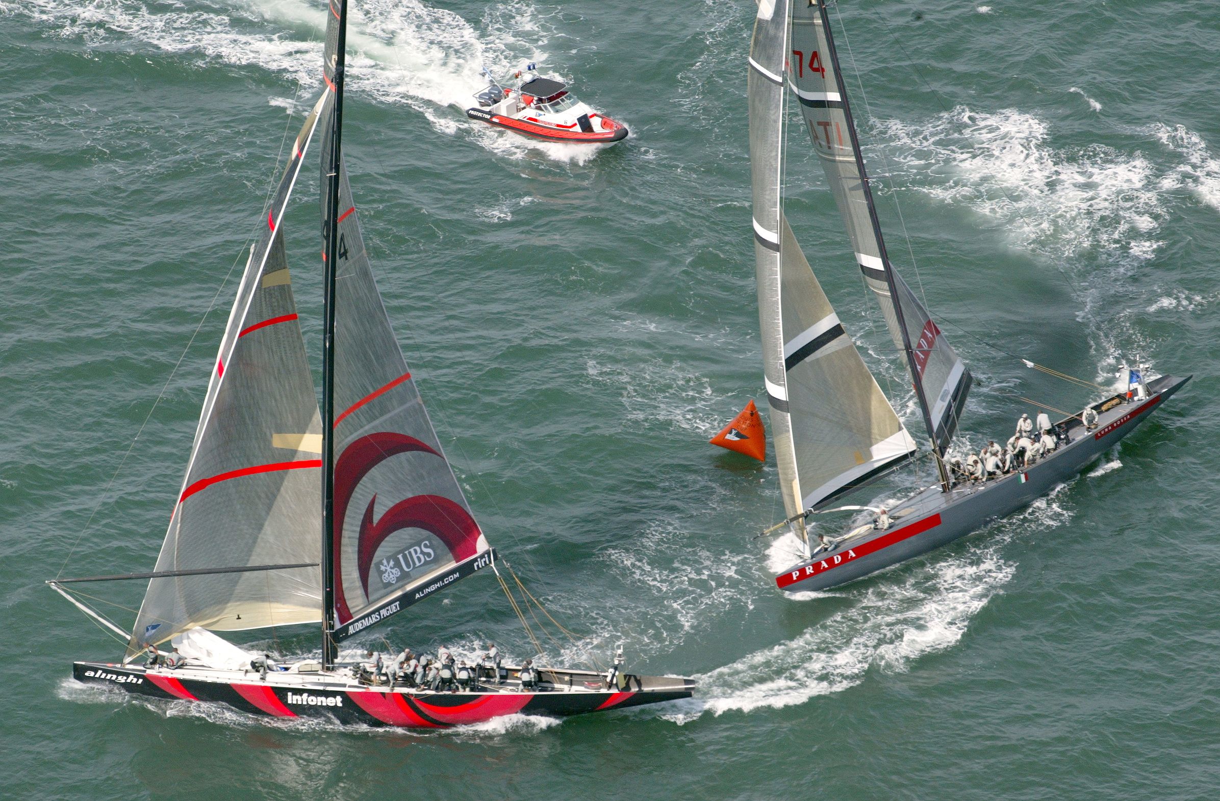 Alinghi just leads Prada around the first mark during the first race in the quarter-finals of the 2002 Louis Vuitton Cup. Photo / Brett Phibbs, New Zealand Herald